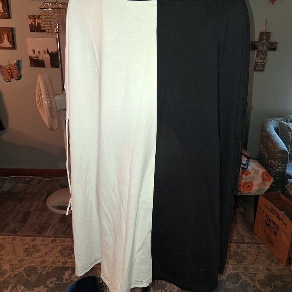 pretty womans black and white stripped shirt with fringe on it. - Picture 3 of 3